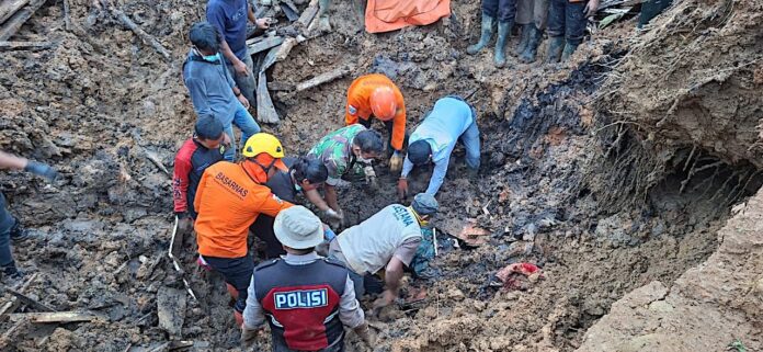 flood and slide on land Sumatra
