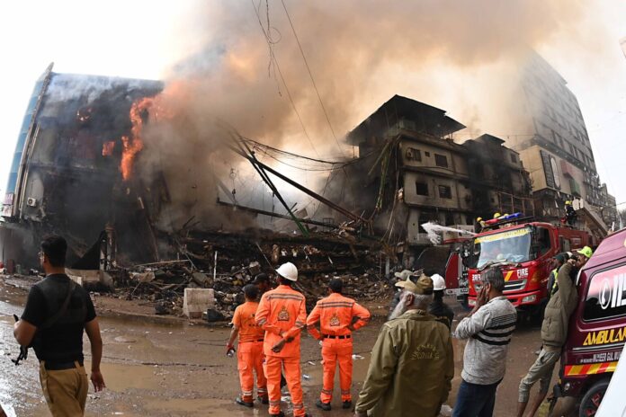 At least six killed as fire rips through Karachi shopping center