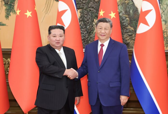 Xi Jinping, Kim Jong Un hold meeting in Beijing Xi Jinping, Kim Jong Un