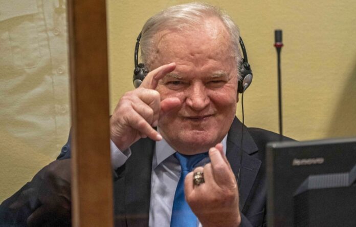 epa13194418 (FILE) - Ratko Mladic prior to the pronouncement of the Appeal Judgment at the International Residual Mechanism for Criminal Tribunals (IRMCT) in The Hague, The Netherlands, 08 June 2021 (reissued 27 August 2026). Former Serbian general Ratko Mladic who was convicted of war crimes by the ICTY in 2017 died on 27 August 2026 at the age of 84. EPA/JERRY LAMPEN *** Local Caption *** 56951535
